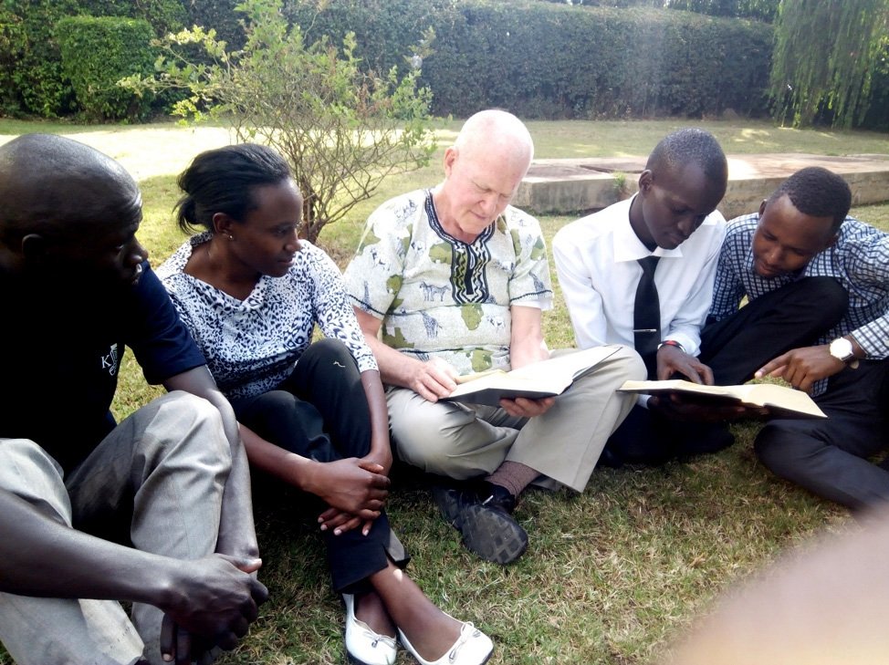 Maryknoll Father Joseph Healey, pictured in an undated photo, discusses Bible sharing and Bible reflection as central to Small Christian Communities with students from Kenyatta University in Nairobi, Kenya. (OSV News photo/Sean Sprague, courtesy Maryknoll)