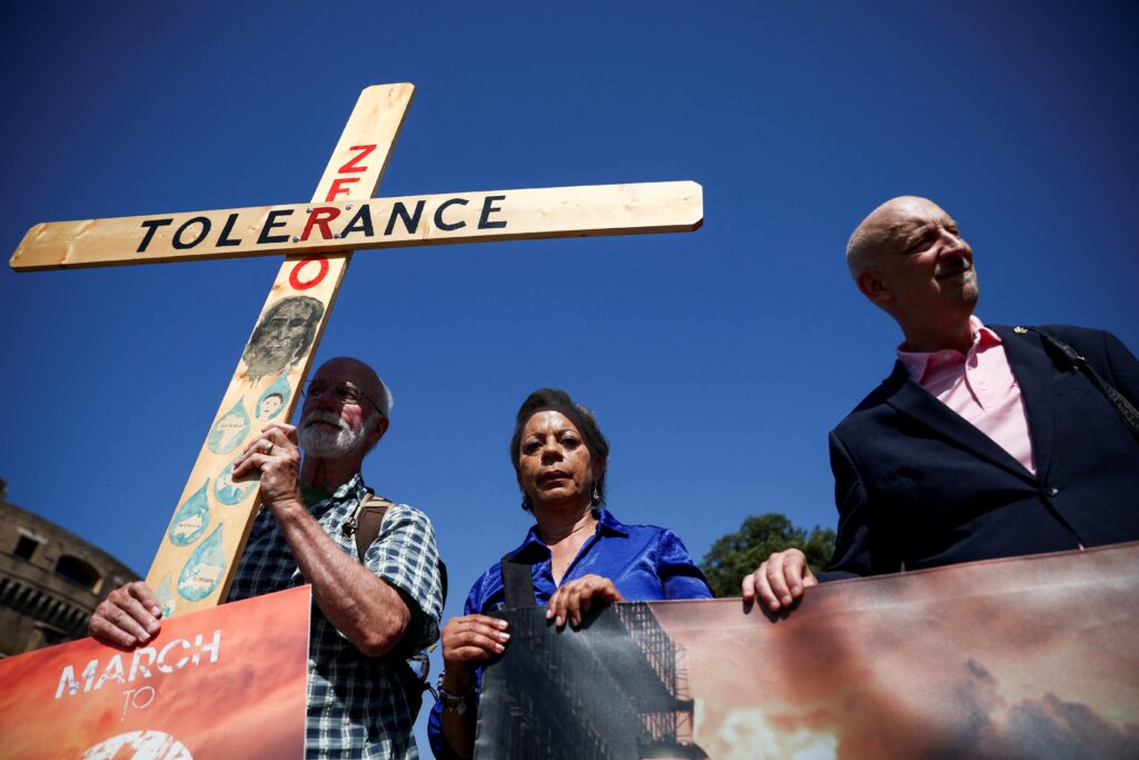 Advocates of zero tolerence for clergy sexual abuse including Peter Isely, right, Tim Law, and Denise Buchanan, attend a march with survivors of clergy sexual abuse and activists near the Vatican in Rome Sept. 27, 2023. (OSV News photo/Guglielmo Mangiapane, Reuters)